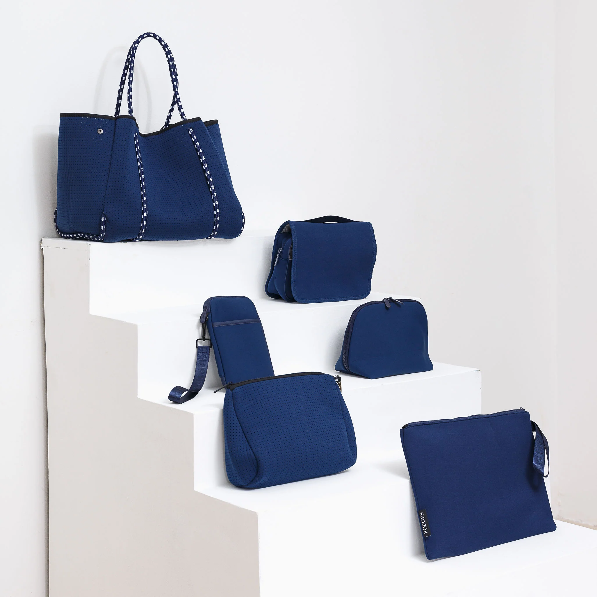 DEEP BLUE EVERYTHING SET: EVERYDAY TOTE + LAPTOP SLEEVE + TOILETRY BAG + PASSPORT WALLET + ESSENTIAL POUCH + MAKEUP POUCH